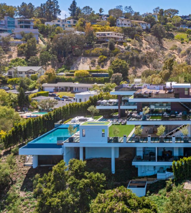 ROBB REPORT — Inside a $44 Million LA Mansion With a Kobe Bryant-Themed Basketball Court and an Underground Car Gallery