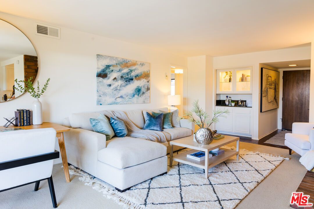 123 E Oak Ave #207